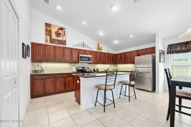 This spacious 3 Bedroom home is located in the highly esteemed on Plantation Bay Golf and Country Club in Florida - for sale on GolfHomes.com, golf home, golf lot