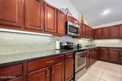 This spacious 3 Bedroom home is located in the highly esteemed on Plantation Bay Golf and Country Club in Florida - for sale on GolfHomes.com, golf home, golf lot