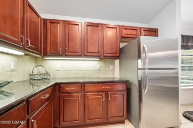 This spacious 3 Bedroom home is located in the highly esteemed on Plantation Bay Golf and Country Club in Florida - for sale on GolfHomes.com, golf home, golf lot
