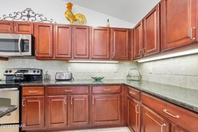 This spacious 3 Bedroom home is located in the highly esteemed on Plantation Bay Golf and Country Club in Florida - for sale on GolfHomes.com, golf home, golf lot