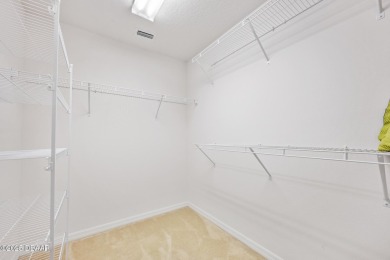 This spacious 3 Bedroom home is located in the highly esteemed on Plantation Bay Golf and Country Club in Florida - for sale on GolfHomes.com, golf home, golf lot