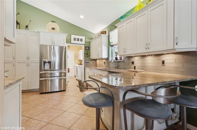 BEAUTIFUL 4 BEDROOM 2 BATH POOL HOME SITUATED ON GOLF COURSE & on TPC Eagle Trace in Florida - for sale on GolfHomes.com, golf home, golf lot