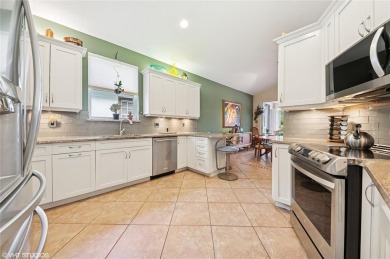 BEAUTIFUL 4 BEDROOM 2 BATH POOL HOME SITUATED ON GOLF COURSE & on TPC Eagle Trace in Florida - for sale on GolfHomes.com, golf home, golf lot