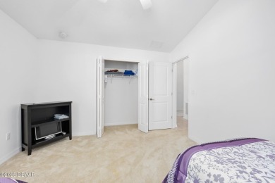 This spacious 3 Bedroom home is located in the highly esteemed on Plantation Bay Golf and Country Club in Florida - for sale on GolfHomes.com, golf home, golf lot