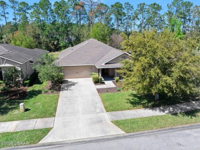 This spacious 3 Bedroom home is located in the highly esteemed on Plantation Bay Golf and Country Club in Florida - for sale on GolfHomes.com, golf home, golf lot