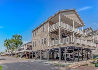 This spacious 5 Bedroom 3.5 Bath raised beach house is just a on Prestwick Country Club in South Carolina - for sale on GolfHomes.com, golf home, golf lot
