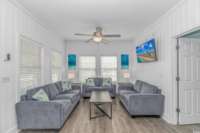 This spacious 5 Bedroom 3.5 Bath raised beach house is just a on Prestwick Country Club in South Carolina - for sale on GolfHomes.com, golf home, golf lot