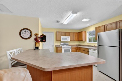 This charming 2/2 Austin Model, located in the desirable Village on The Links of Spruce Creek in Florida - for sale on GolfHomes.com, golf home, golf lot