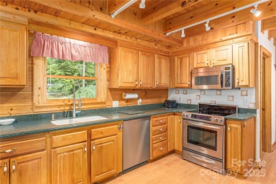 This warm and inviting, solidly built custom log home offers so on Waynesville Country Club Inn in North Carolina - for sale on GolfHomes.com, golf home, golf lot