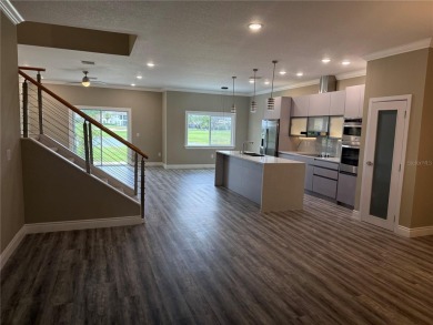 Experience elevated living in this BRAND-NEW, never lived in on Providence Golf Club in Florida - for sale on GolfHomes.com, golf home, golf lot