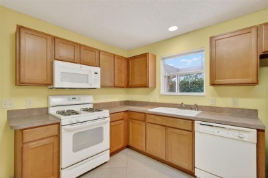 This charming 2/2 Austin Model, located in the desirable Village on The Links of Spruce Creek in Florida - for sale on GolfHomes.com, golf home, golf lot