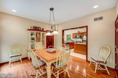 This Tanglwood Lakes home is located only a hop, skip, and jump on Paupack Hills Golf and Country Club in Pennsylvania - for sale on GolfHomes.com, golf home, golf lot