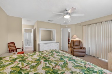 This charming 2/2 Austin Model, located in the desirable Village on The Links of Spruce Creek in Florida - for sale on GolfHomes.com, golf home, golf lot