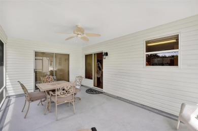 This charming 2/2 Austin Model, located in the desirable Village on The Links of Spruce Creek in Florida - for sale on GolfHomes.com, golf home, golf lot