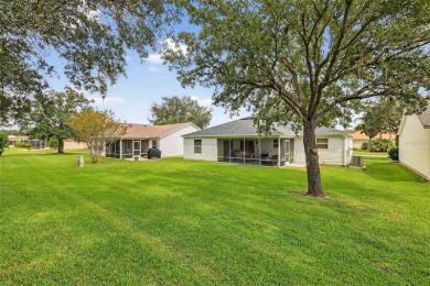 This charming 2/2 Austin Model, located in the desirable Village on The Links of Spruce Creek in Florida - for sale on GolfHomes.com, golf home, golf lot
