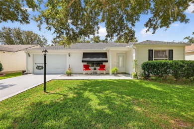 This charming 2/2 Austin Model, located in the desirable Village on The Links of Spruce Creek in Florida - for sale on GolfHomes.com, golf home, golf lot
