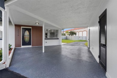 Prime location in the heart of Dunedin! 3-bedroom, 2-bath home on The Dunedin Country Club in Florida - for sale on GolfHomes.com, golf home, golf lot