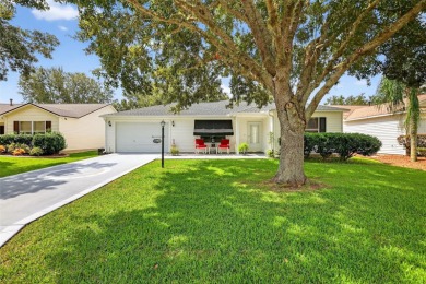 This charming 2/2 Austin Model, located in the desirable Village on The Links of Spruce Creek in Florida - for sale on GolfHomes.com, golf home, golf lot