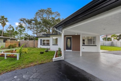 Prime location in the heart of Dunedin! 3-bedroom, 2-bath home on The Dunedin Country Club in Florida - for sale on GolfHomes.com, golf home, golf lot
