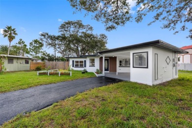 Prime location in the heart of Dunedin! 3-bedroom, 2-bath home on The Dunedin Country Club in Florida - for sale on GolfHomes.com, golf home, golf lot