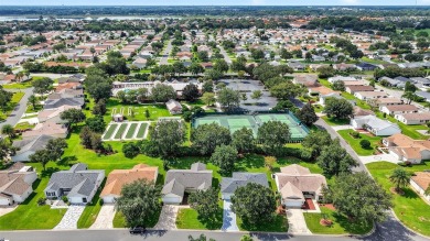 This charming 2/2 Austin Model, located in the desirable Village on The Links of Spruce Creek in Florida - for sale on GolfHomes.com, golf home, golf lot