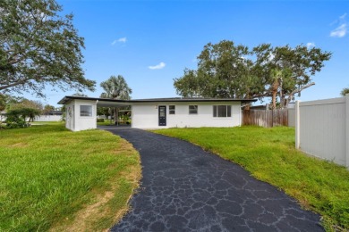 Prime location in the heart of Dunedin! 3-bedroom, 2-bath home on The Dunedin Country Club in Florida - for sale on GolfHomes.com, golf home, golf lot