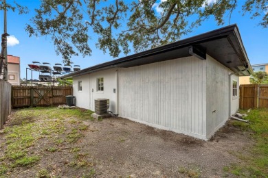Prime location in the heart of Dunedin! 3-bedroom, 2-bath home on The Dunedin Country Club in Florida - for sale on GolfHomes.com, golf home, golf lot