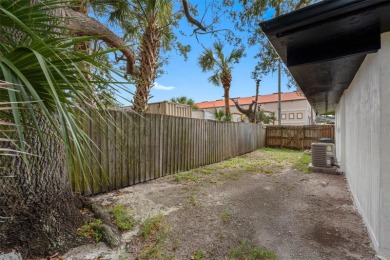 Prime location in the heart of Dunedin! 3-bedroom, 2-bath home on The Dunedin Country Club in Florida - for sale on GolfHomes.com, golf home, golf lot