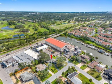 Prime location in the heart of Dunedin! 3-bedroom, 2-bath home on The Dunedin Country Club in Florida - for sale on GolfHomes.com, golf home, golf lot