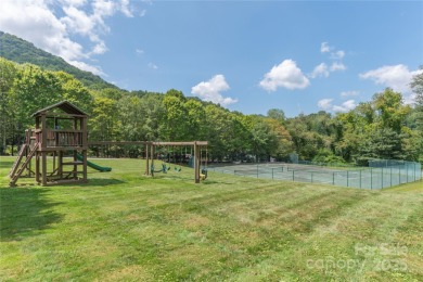 This warm and inviting, solidly built custom log home offers so on Waynesville Country Club Inn in North Carolina - for sale on GolfHomes.com, golf home, golf lot
