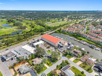 Prime location in the heart of Dunedin! 3-bedroom, 2-bath home on The Dunedin Country Club in Florida - for sale on GolfHomes.com, golf home, golf lot