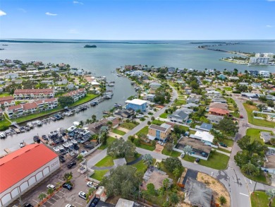 Prime location in the heart of Dunedin! 3-bedroom, 2-bath home on The Dunedin Country Club in Florida - for sale on GolfHomes.com, golf home, golf lot