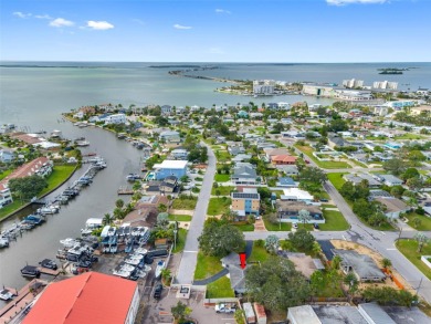 Prime location in the heart of Dunedin! 3-bedroom, 2-bath home on The Dunedin Country Club in Florida - for sale on GolfHomes.com, golf home, golf lot