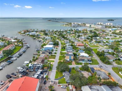 Prime location in the heart of Dunedin! 3-bedroom, 2-bath home on The Dunedin Country Club in Florida - for sale on GolfHomes.com, golf home, golf lot