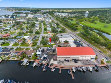 Prime location in the heart of Dunedin! 3-bedroom, 2-bath home on The Dunedin Country Club in Florida - for sale on GolfHomes.com, golf home, golf lot