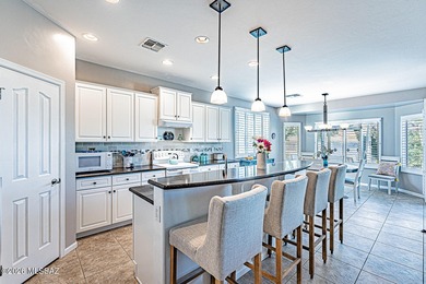 Embrace this serene oasis at 2445 E Sky Creek Drive, where every on Quail Creek Country Club  in Arizona - for sale on GolfHomes.com, golf home, golf lot