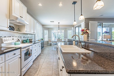 Embrace this serene oasis at 2445 E Sky Creek Drive, where every on Quail Creek Country Club  in Arizona - for sale on GolfHomes.com, golf home, golf lot