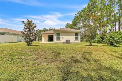 Nestled on a peaceful cul-de-sac in one of Bunnell's most on Grand Reserve Golf Course in Florida - for sale on GolfHomes.com, golf home, golf lot