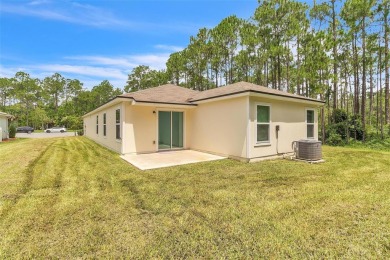 Nestled on a peaceful cul-de-sac in one of Bunnell's most on Grand Reserve Golf Course in Florida - for sale on GolfHomes.com, golf home, golf lot