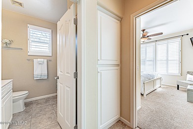 Embrace this serene oasis at 2445 E Sky Creek Drive, where every on Quail Creek Country Club  in Arizona - for sale on GolfHomes.com, golf home, golf lot