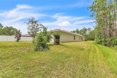 Nestled on a peaceful cul-de-sac in one of Bunnell's most on Grand Reserve Golf Course in Florida - for sale on GolfHomes.com, golf home, golf lot