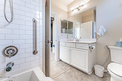 Embrace this serene oasis at 2445 E Sky Creek Drive, where every on Quail Creek Country Club  in Arizona - for sale on GolfHomes.com, golf home, golf lot