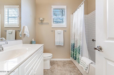 Embrace this serene oasis at 2445 E Sky Creek Drive, where every on Quail Creek Country Club  in Arizona - for sale on GolfHomes.com, golf home, golf lot