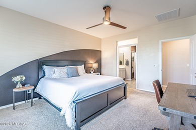 Embrace this serene oasis at 2445 E Sky Creek Drive, where every on Quail Creek Country Club  in Arizona - for sale on GolfHomes.com, golf home, golf lot