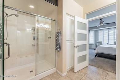 Embrace this serene oasis at 2445 E Sky Creek Drive, where every on Quail Creek Country Club  in Arizona - for sale on GolfHomes.com, golf home, golf lot