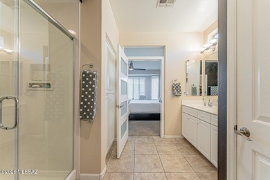 Embrace this serene oasis at 2445 E Sky Creek Drive, where every on Quail Creek Country Club  in Arizona - for sale on GolfHomes.com, golf home, golf lot