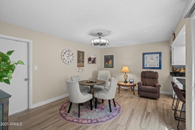 This beautifully maintained 2-bedroom, 2-bath home backs to on Ahwatukee Country Club in Arizona - for sale on GolfHomes.com, golf home, golf lot