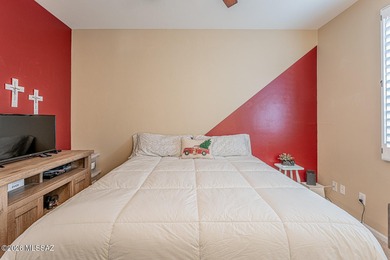 Embrace this serene oasis at 2445 E Sky Creek Drive, where every on Quail Creek Country Club  in Arizona - for sale on GolfHomes.com, golf home, golf lot