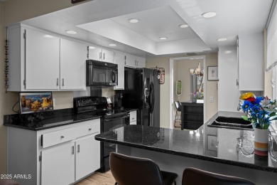 This beautifully maintained 2-bedroom, 2-bath home backs to on Ahwatukee Country Club in Arizona - for sale on GolfHomes.com, golf home, golf lot