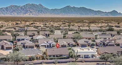Embrace this serene oasis at 2445 E Sky Creek Drive, where every on Quail Creek Country Club  in Arizona - for sale on GolfHomes.com, golf home, golf lot
